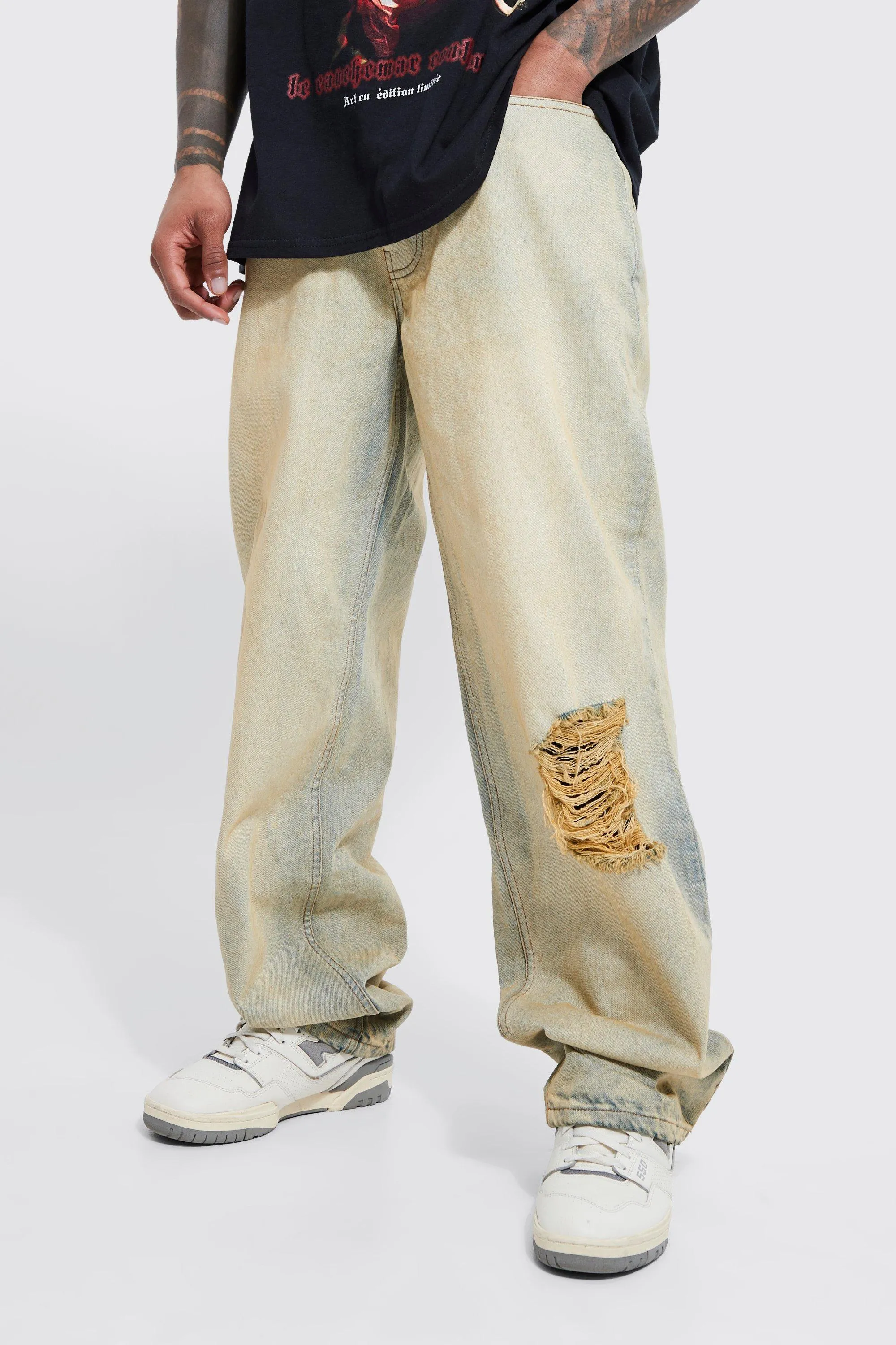 Baggy Fit Jeans With Knee Rip