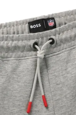 BOSS x NFL signature-tape tracksuit bottoms with special branding