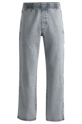 Grey relaxed-fit jeans with side poppers and contrasting tape