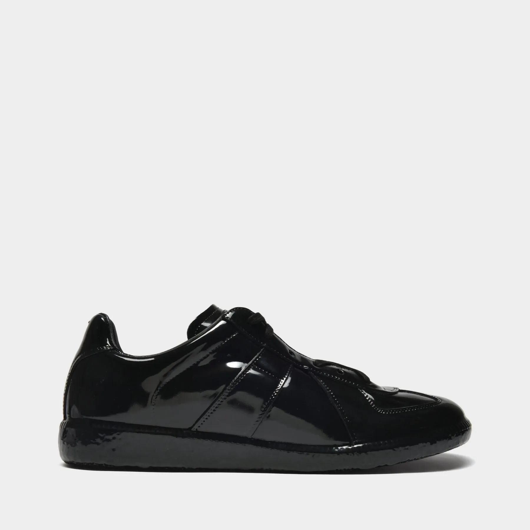 Maison Margiela  Replica Low Top Sneakers in Black Leather