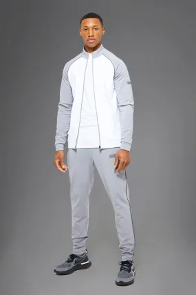 Man Active Block Piping Funnel Neck Tracksuit | boohooMAN UK