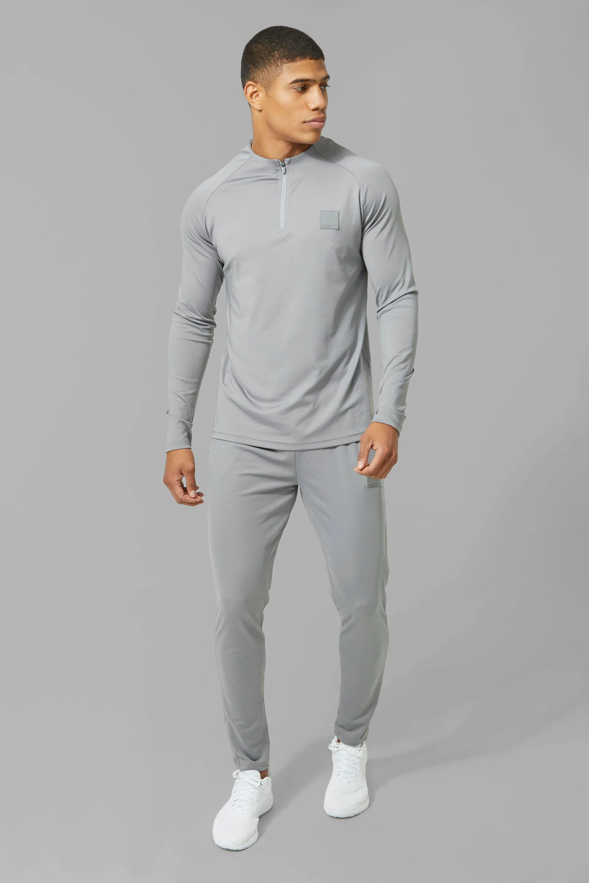 Man Active Skinny Crew Neck 1/4 Zip Tracksuit