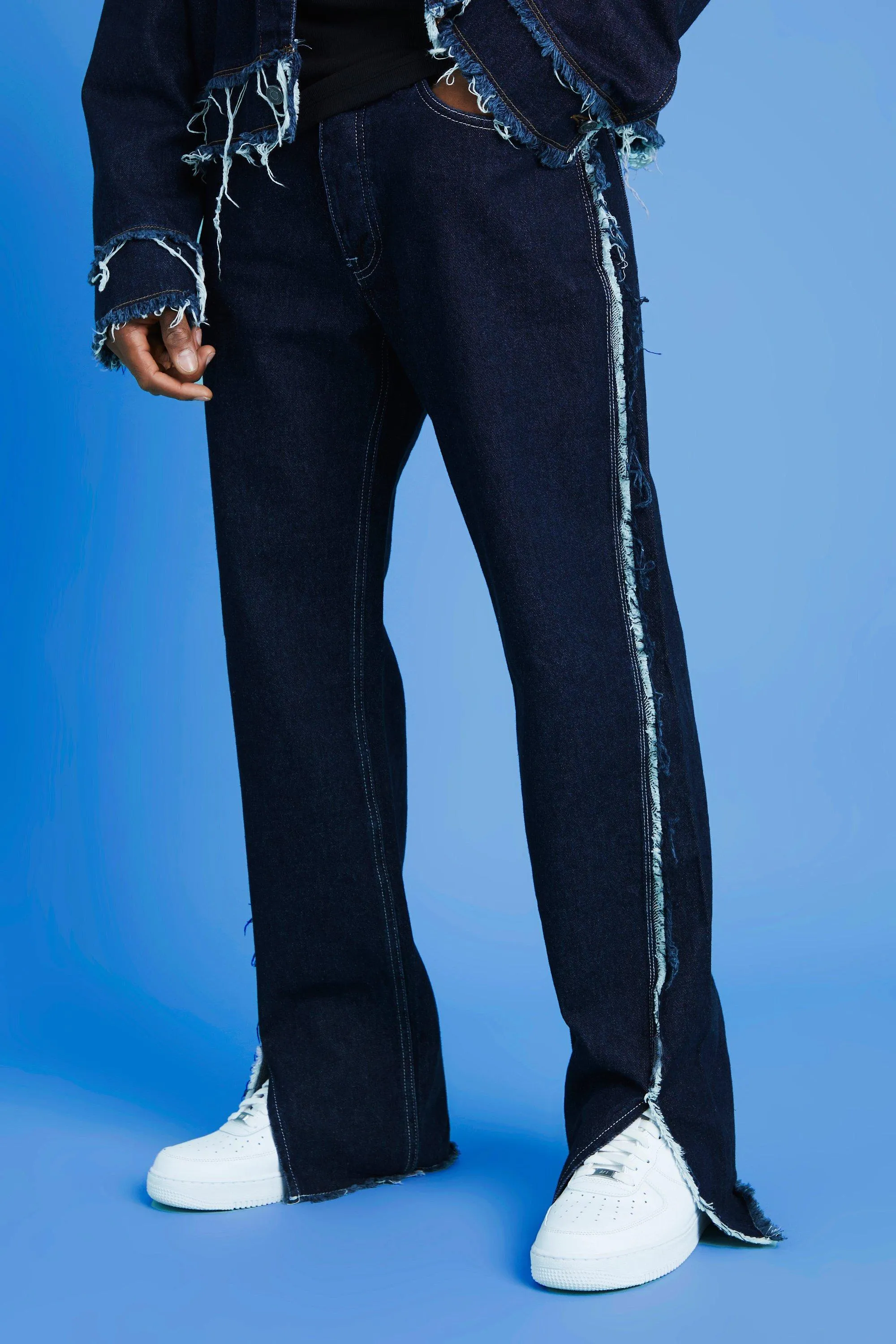 Relaxed Fit Frayed Seam Jeans With Split Hem